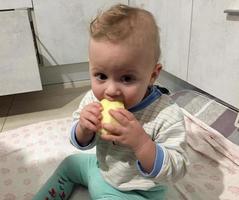 Beautiful baby boy with child face posing photographer photo