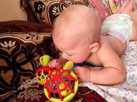 Beautiful baby boy with child face posing photographer photo