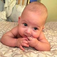 Beautiful baby boy with child face posing photographer photo