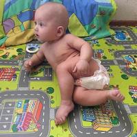 Beautiful baby boy with child face posing photographer photo