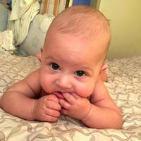 Beautiful baby boy with child face posing photographer photo