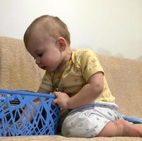 Beautiful baby boy with child face posing photographer photo