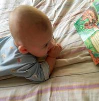 Beautiful baby boy with child face posing photographer photo