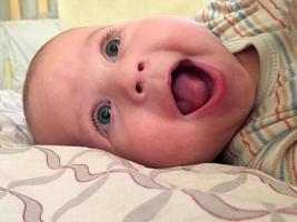 Beautiful baby boy with child face posing photographer photo