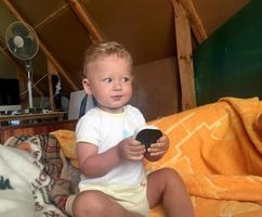 Beautiful baby boy with child face posing photographer photo