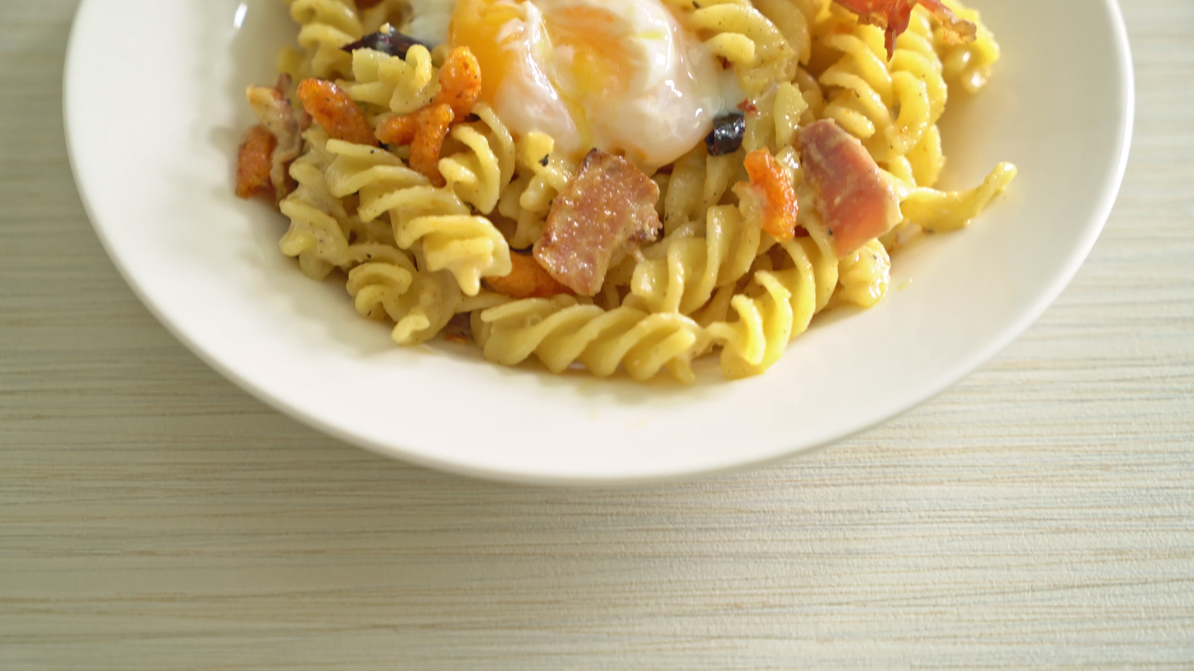 carbonara fusilli pasta spicy bacon Italian food style 5375665 Stock