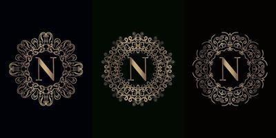 colección de logotipo inicial n con marco de adorno de mandala de lujo vector