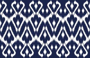 Ethnic Ikat Abstract Blue color. Seamless pattern in tribal, folk embroidery, and Mexican style. Aztec geometric art ornament print.Design for carpet, wallpaper, clothing, wrapping, fabric, cover