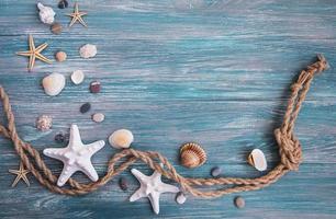 Seashells and sea decorations with rope photo