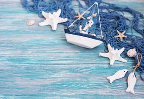 Fishing net with starfish and sea decorations photo