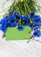 paper tag with  cornflowers photo