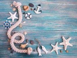 Seashells and sea decorations with rope photo