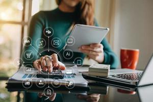 Businessman working with smart phone and laptop and digital tablet computer in  office with digital marketing media  in virtual icon photo