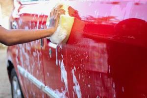 Washing red car photo