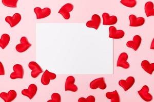 Blank greeting card and hearts for valentine's day. photo