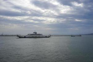 Taman, Russia-June 11, 2015 -Seascape with a ferry on the background of the Kerch Strait. photo