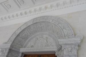 Yalta, Crimea-may 30, 2016- Architecture and interior design of the Livadia Palace. Details of the interior of marble with beautiful patterns in the form of flowers and mythical animals. photo