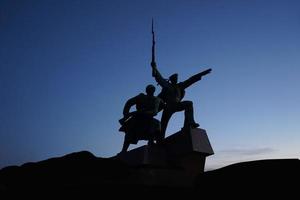 Sevastopol, Crimea-March 16, 2015 -Monument to soldier and sailor on the background of the evening sky photo