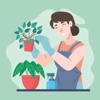 mujer cuidando las plantas vector