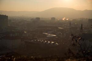 Graz Cityscape in Austria. Graz is the capital city of the southern Austrian province of Styria. At its heart is Hauptplatz, the medieval old town s main square. Beautiful Sunset Light. photo