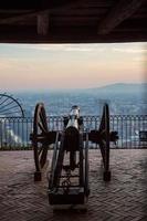 Cannon on the wall of the Schlossberg hill of Graz, Austria is aimed to defend the city. photo