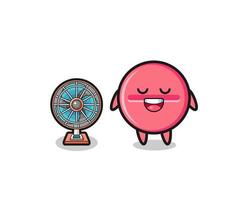 cute medicine tablet is standing in front of the fan vector