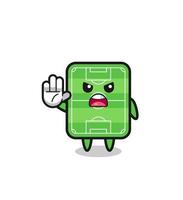 personaje de campo de fútbol haciendo gesto de parada vector