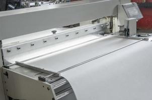 equipment are cut and furrowing the felt fabric for automotive filters photo