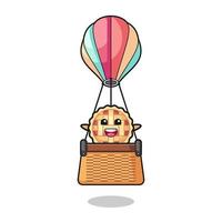 mascota de la tarta de manzana montando un globo aerostático vector