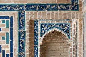 Dome in the form of an arch in traditional Asian mosaic. Details of the architecture of medieval Central Asia photo