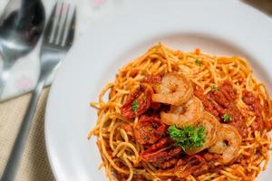 Spaghetti topped with shrimp sauce