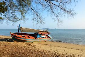 Fishing boat aground photo