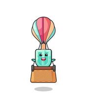 popsicles mascot riding a hot air balloon vector