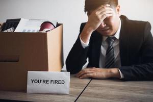 Male employee is stressed or angry while he is fired from being an employee of the company. photo