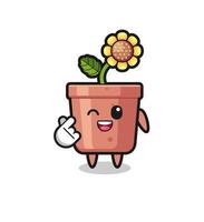 sunflower pot character doing Korean finger heart vector