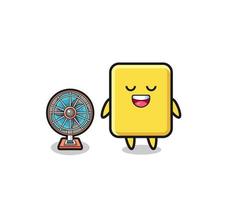 cute yellow card is standing in front of the fan vector