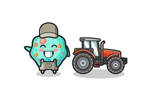 the amoeba farmer mascot standing beside a tractor vector