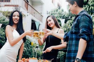 Asian teenager celebrate about education congratulate together at garden in home. photo