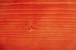 Red natural wood as a background texture photo