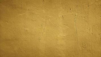 yellow abstract texture cement concrete wall background photo