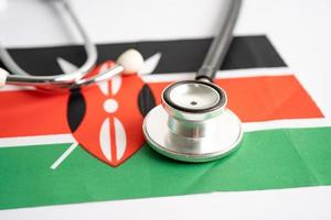 Black stethoscope on Kenya flag background, Business and finance concept. photo