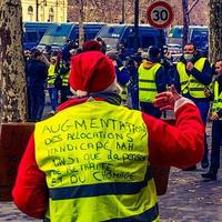 Demonstrators during a protest in yellow vests photo