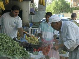 Different muslim people handles personal affairs after conflict with military during curfews photo