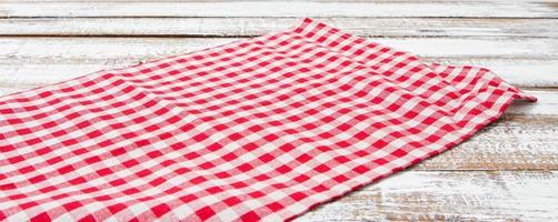 top view - tablecloth on empty wooden table photo