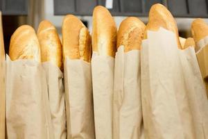 Fresh baked bread in supermarket. Fresh delicious food. Bakery.Top view. Mock up.Copy space. Selective focus. Summer bread. photo