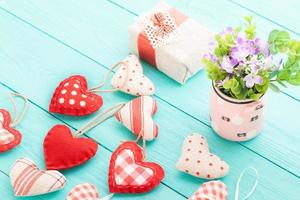 Romantic accessories and copy space on blue wooden background. Top view photo