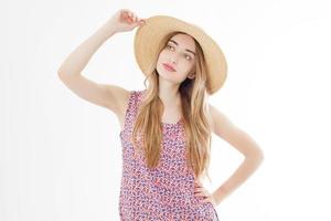 Portrait of Fashion Young woman in Dress. Pretty Girl in Hat. Female model in Stylish Summer Outfit. Vanilla Color. Beautiful Lady on Pink. Vintage. photo