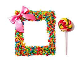 Colorful candy, lollipop and sweets isolated on white background. Top view. Selective focus. photo