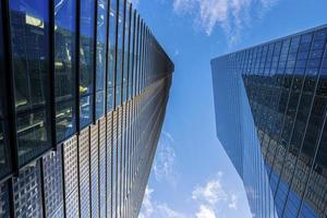 Windows of modern highrise commercial buildings around canary wharf photo