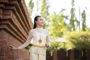 Beautiful Woman wearing typical Thai dress photo